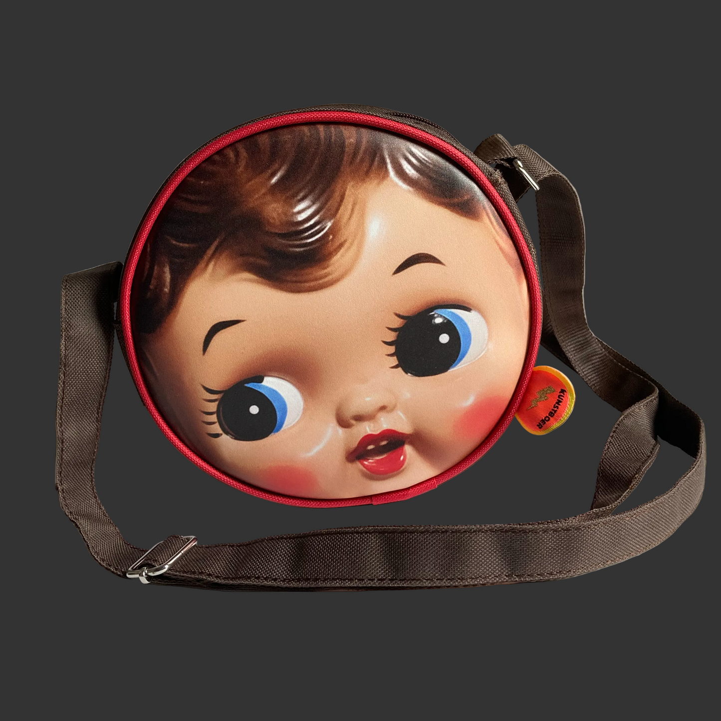 Schultertasche Puppengesicht